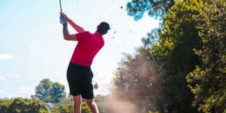 golf courses norfolk - man playing golf