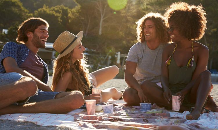 four friends on beach
