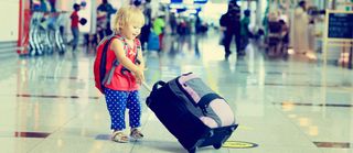 little girl with suitcase travel in the airport, kids travel
