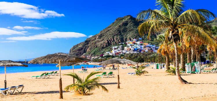tenerife beach with mountain in the background