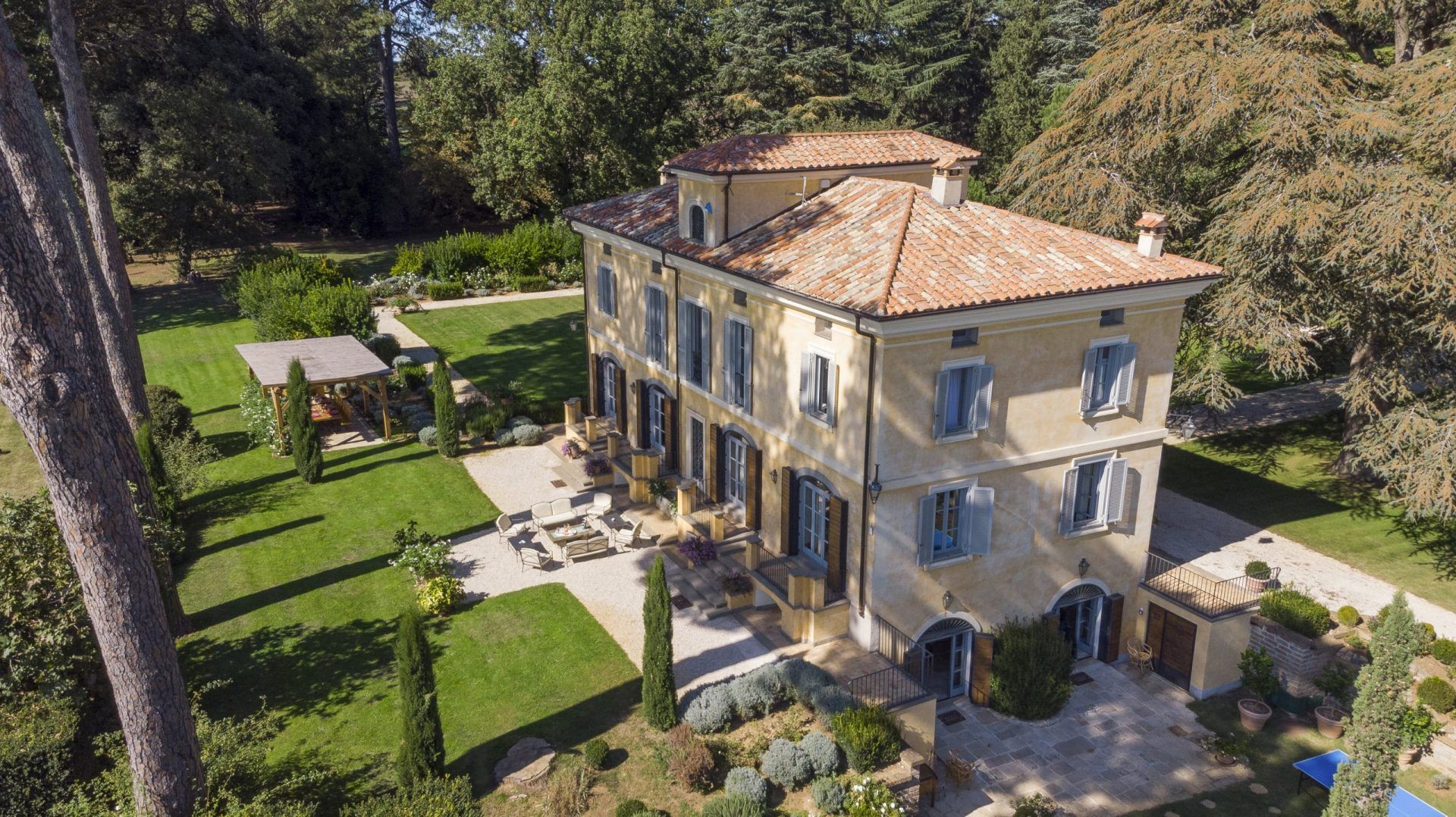 Italian villa from birds eye view with gardens