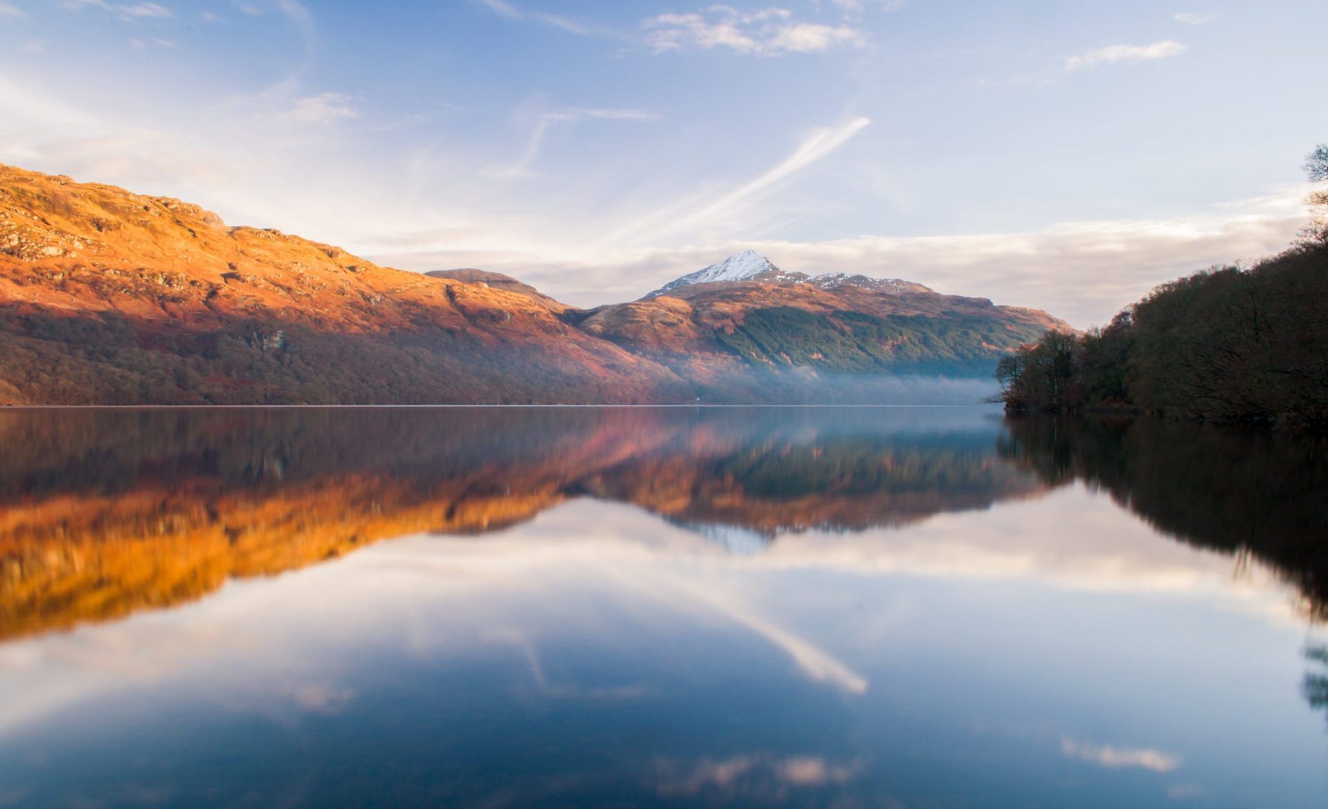 A misty Loch Lomond at sunrise