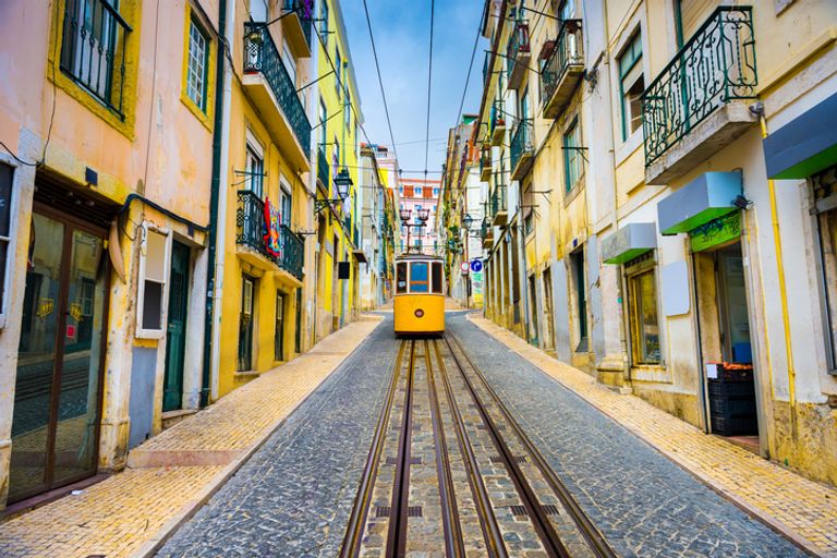 Tram on old street in Lisbon