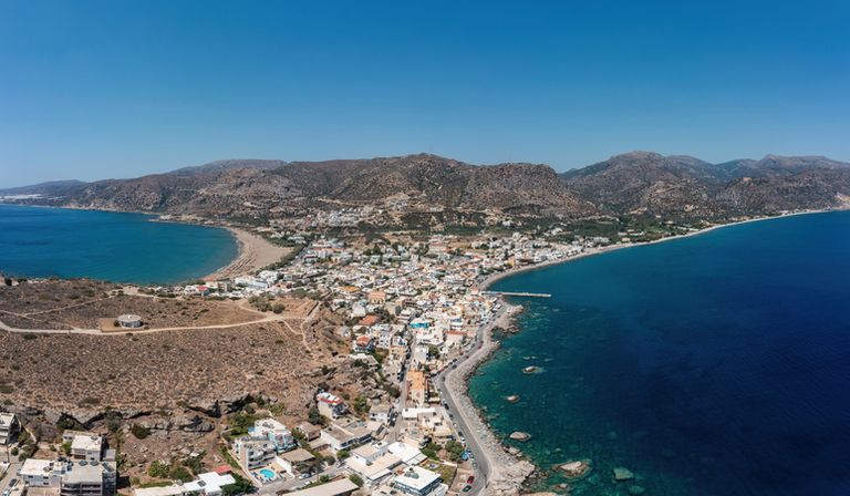 Aerial Panoramic View Of Palaiochora Town and Beach