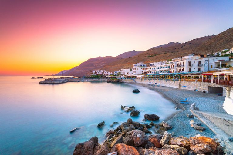 Sunset on the beach in Chora Skafion