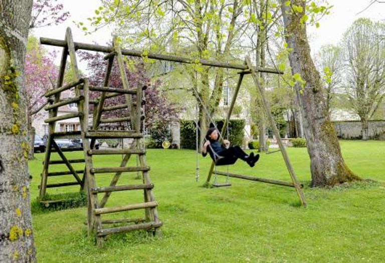 Swingset in a Chateaux Garden