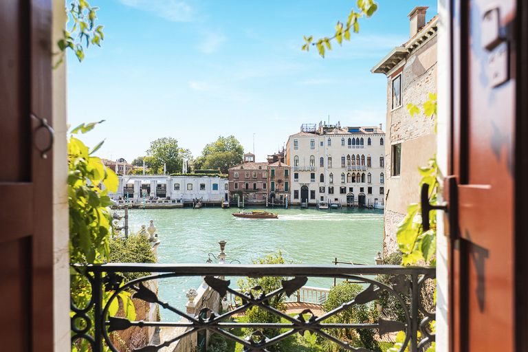 balcony view of canal and houses