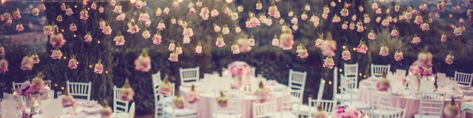 wedding tables with roses hanging