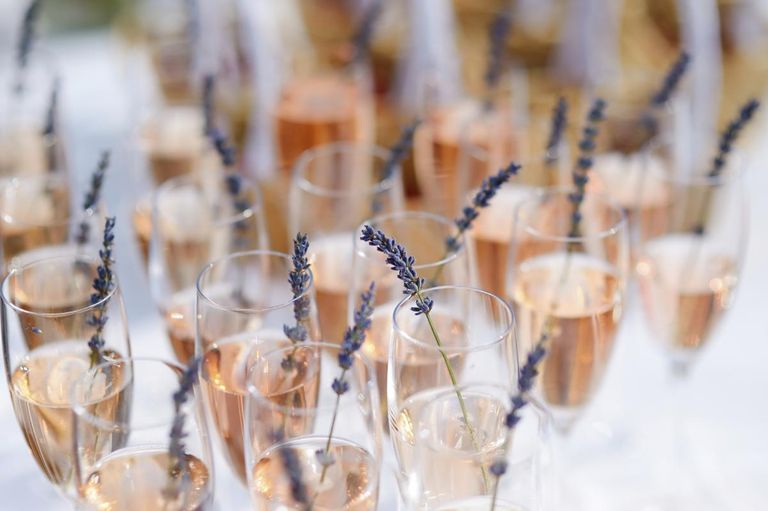 champagne filled glasses with lavender